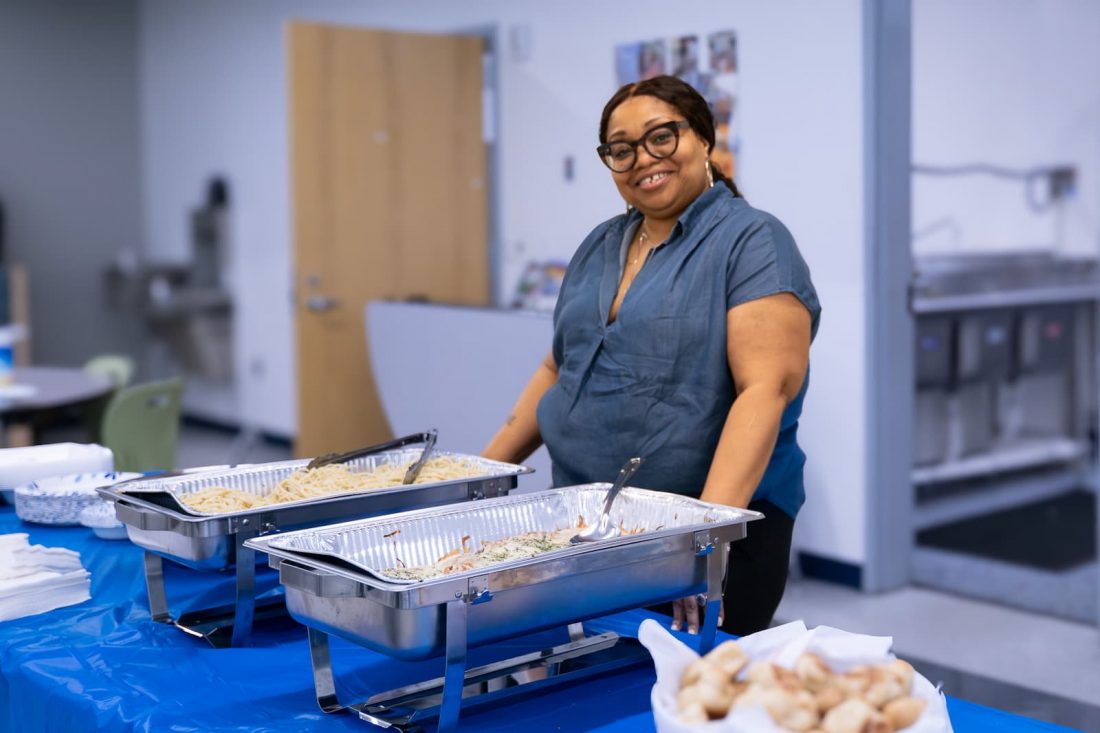 volunteer serving food