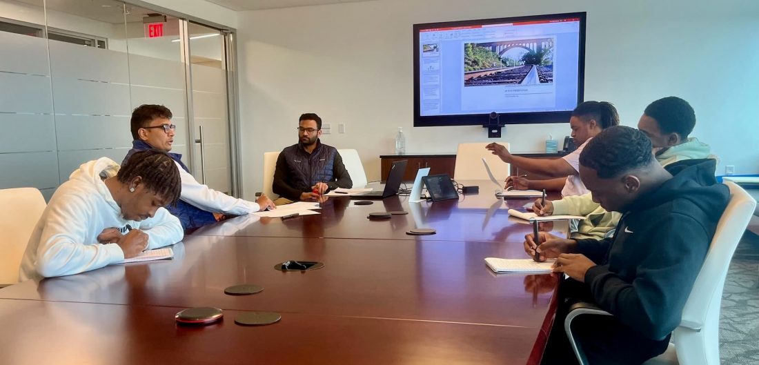 student intern in business meeting